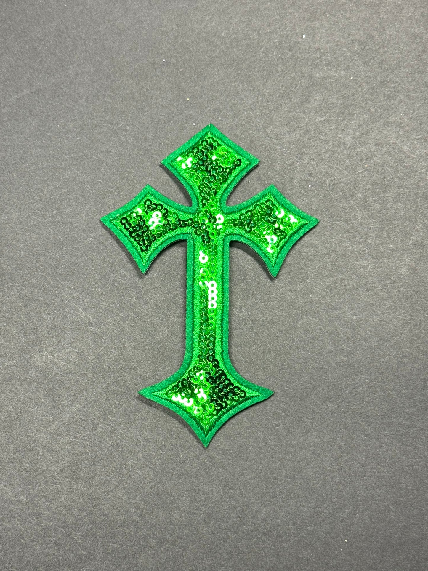 Green sequin cross