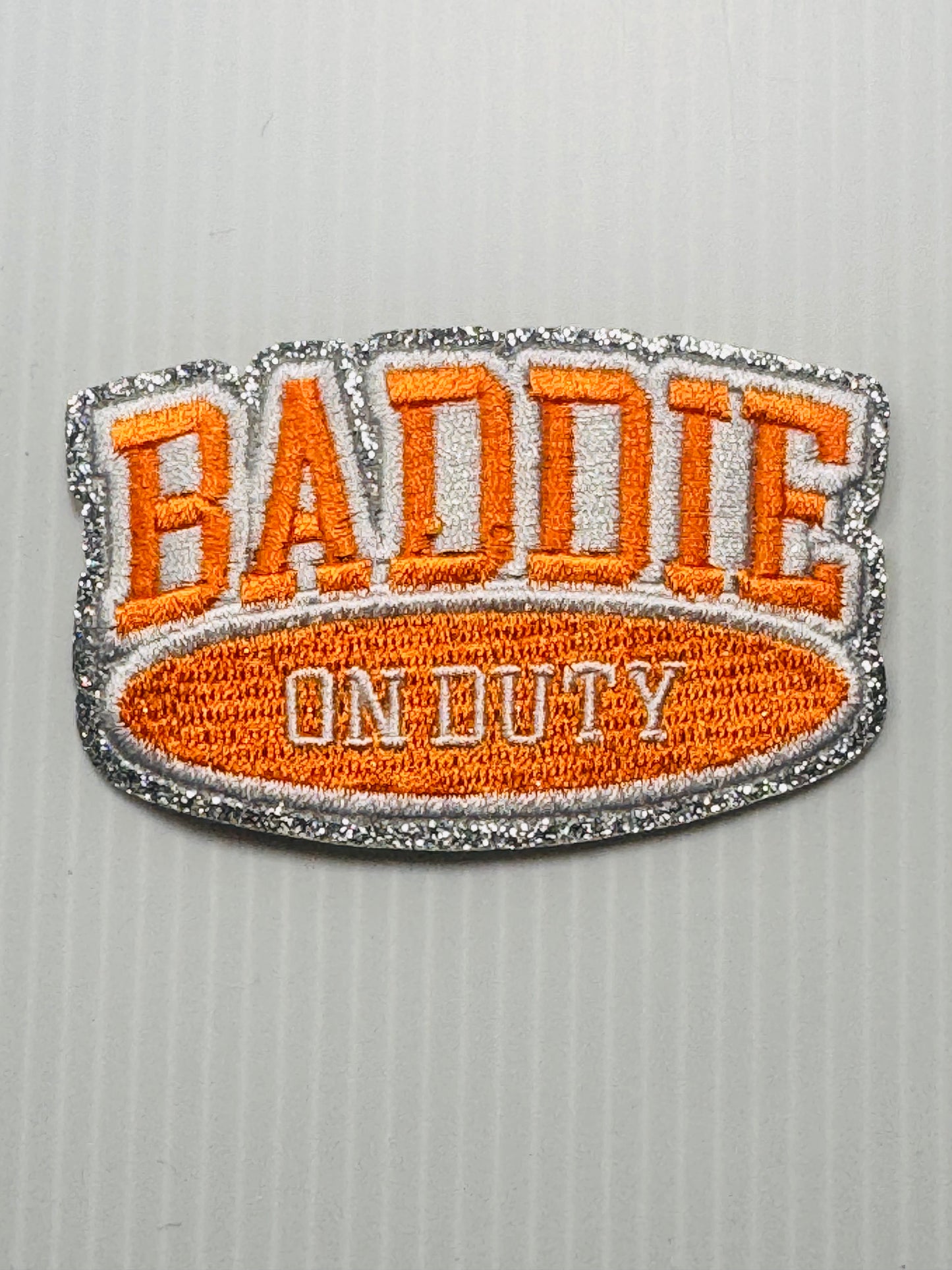 BADDIE ON DUTY ORANGE