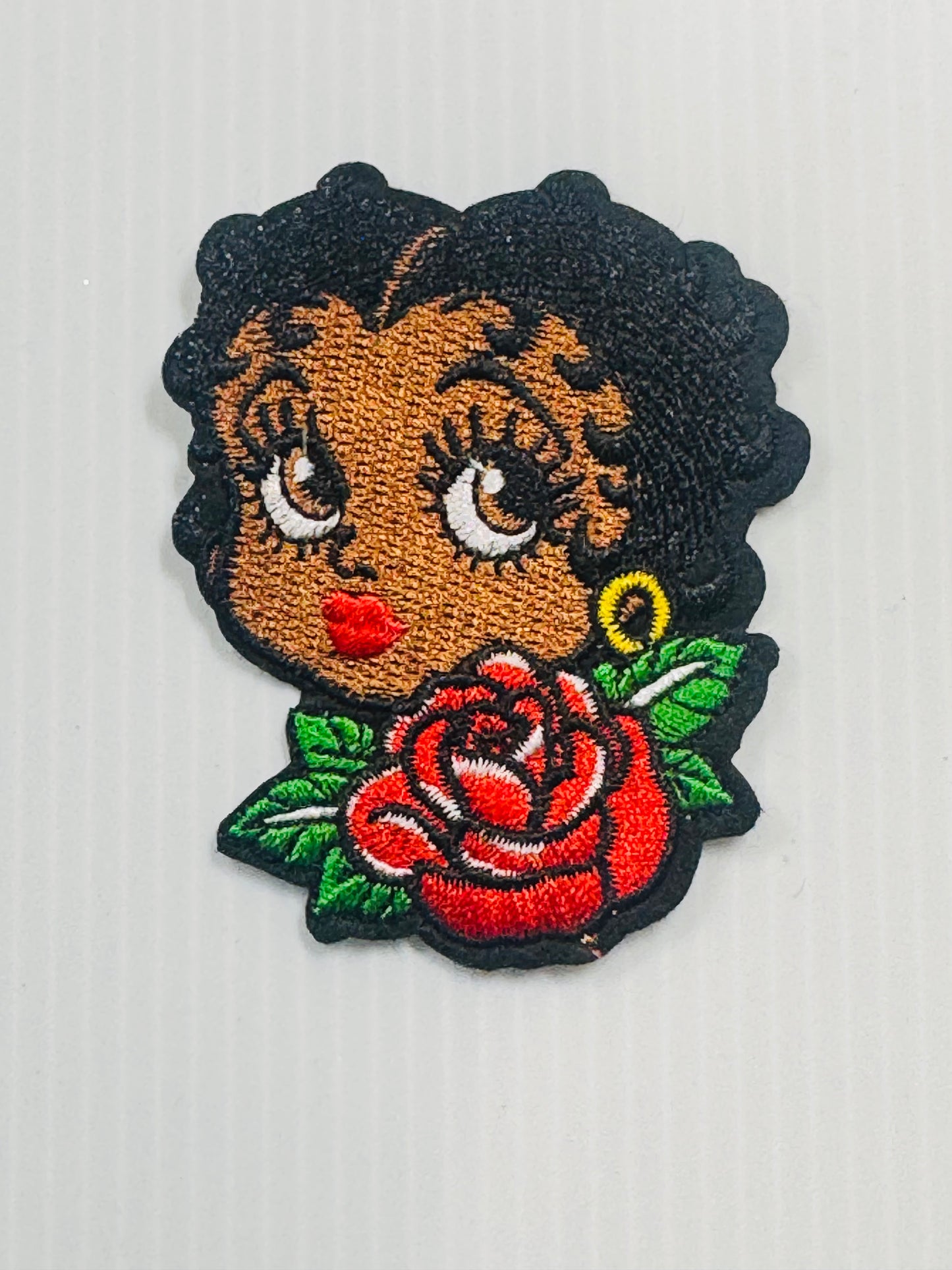 BETTY W/RED ROSE