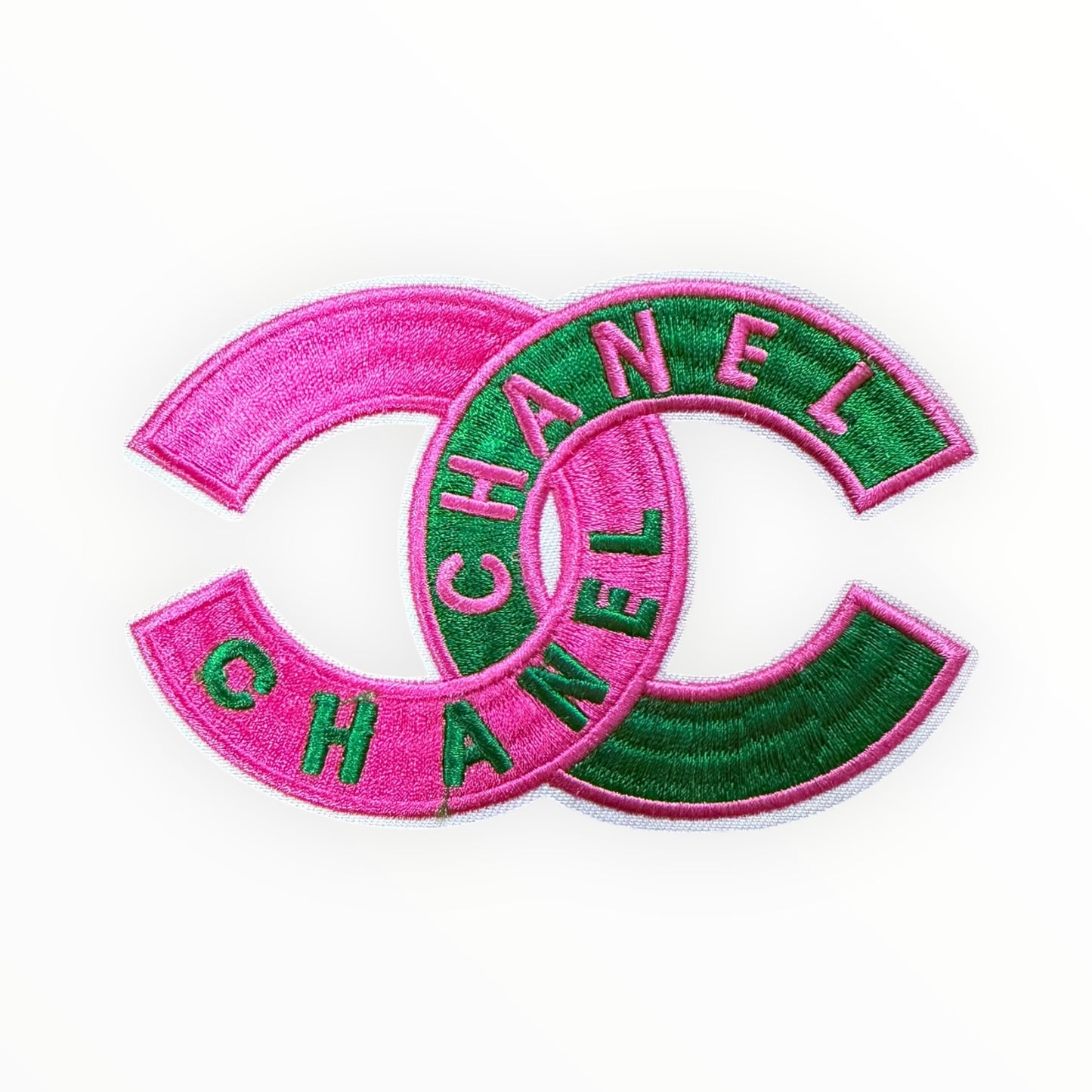 Double C interlocking patch design pink/green