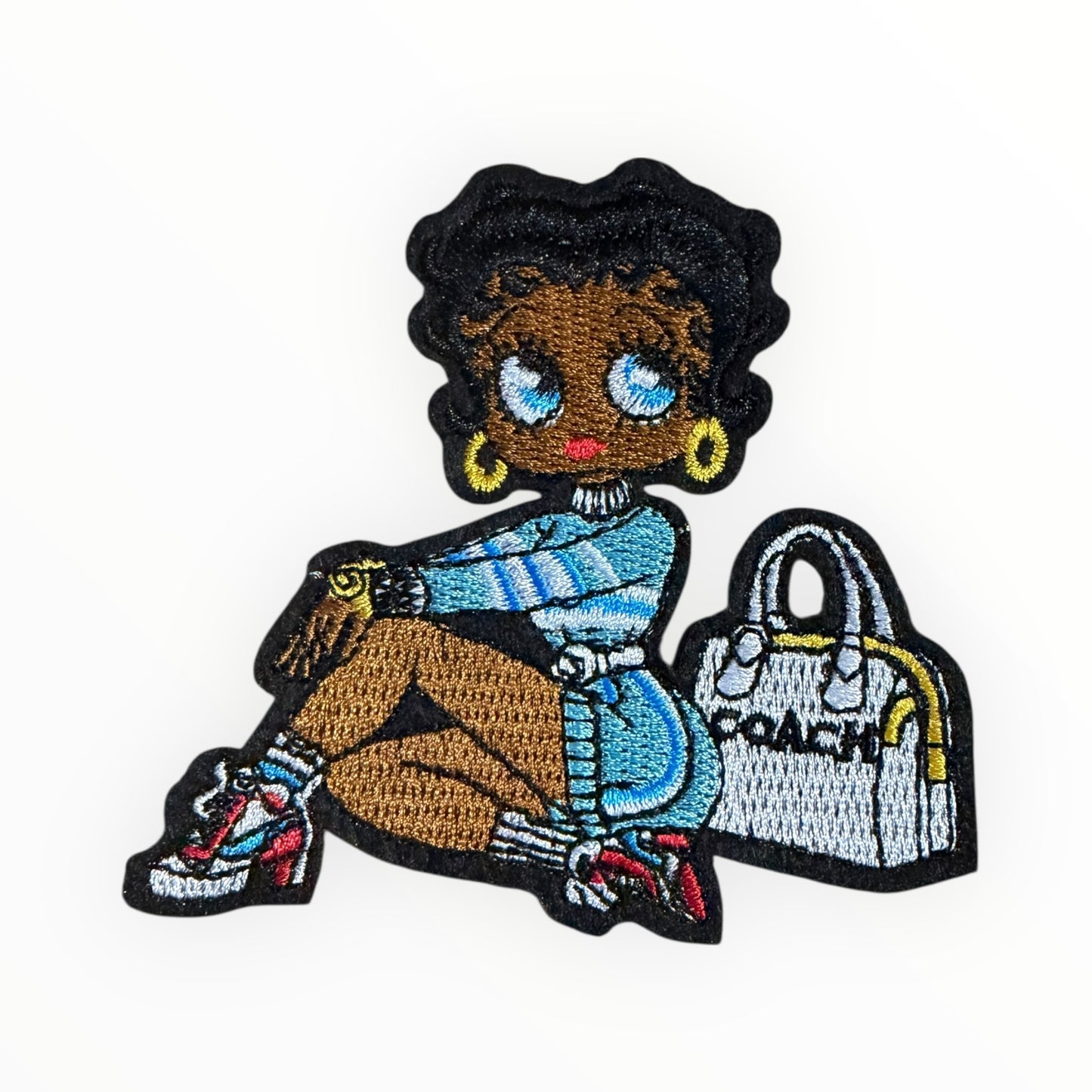 Coach girl sitting patch blue outfit