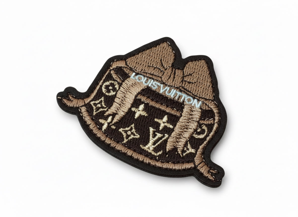 LV-INSPIRED BROWN CAKE W/BOW