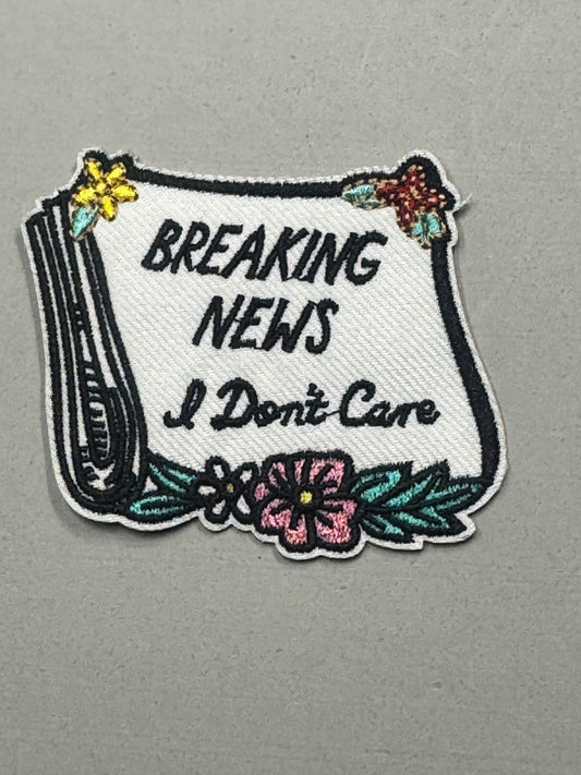 “Breaking News: I Don’t Care” Patch