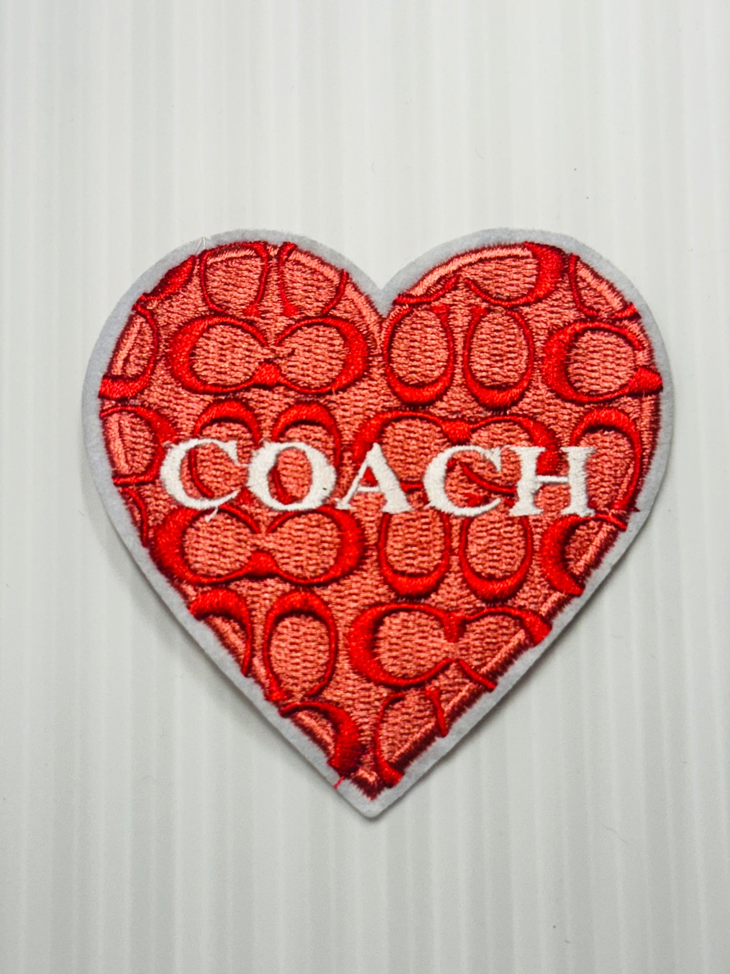 Coach Heart Patch – Red Signature Pattern