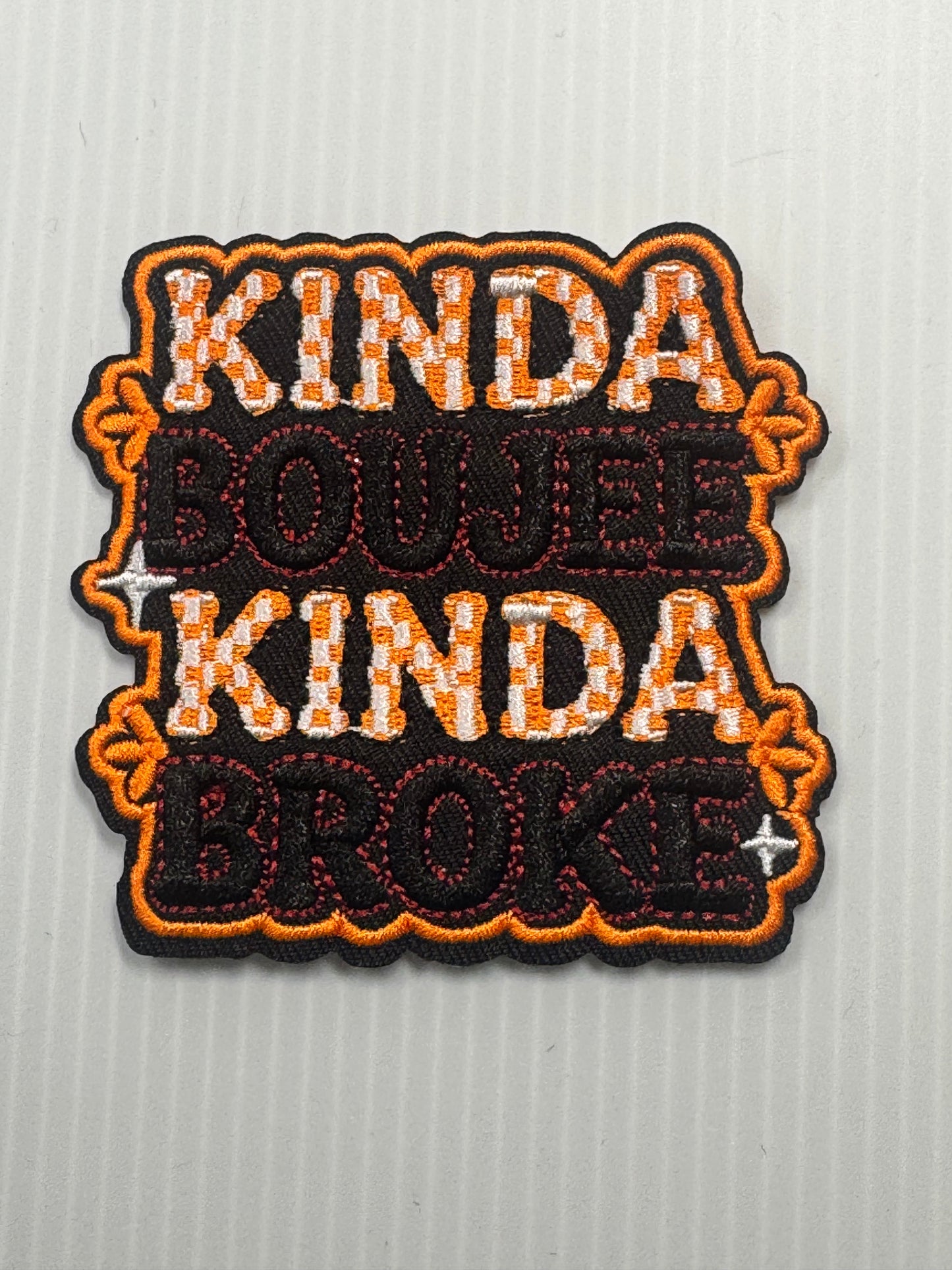 KINDA BOUJIE KINA BROKE