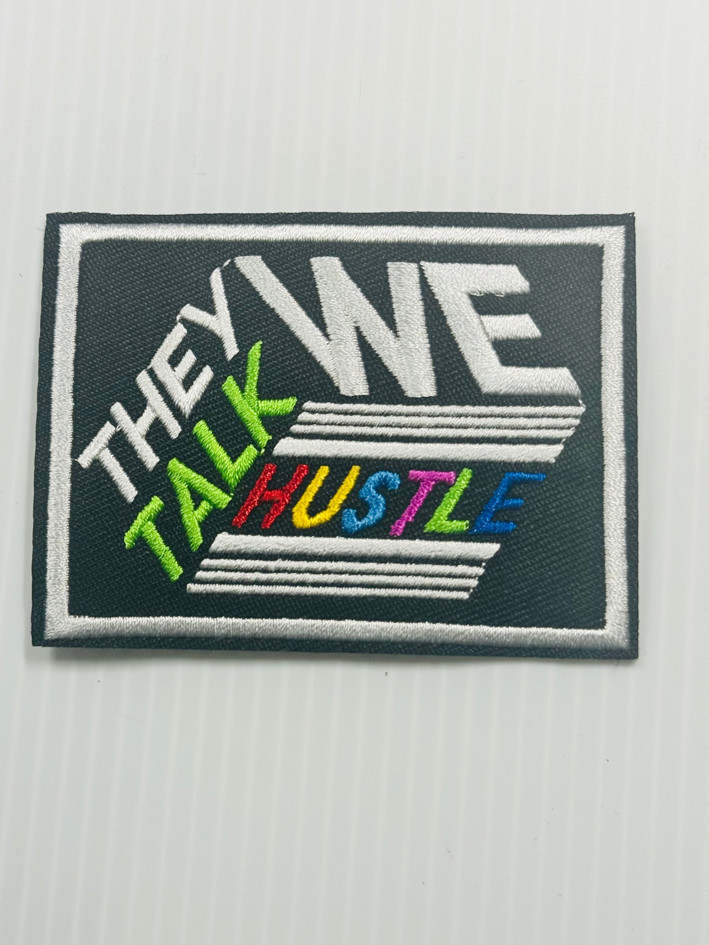 THEY TALK WE HUSTLE