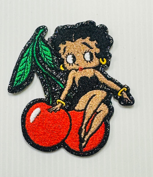 BETTY BOOP SITTING ON A CHERRY