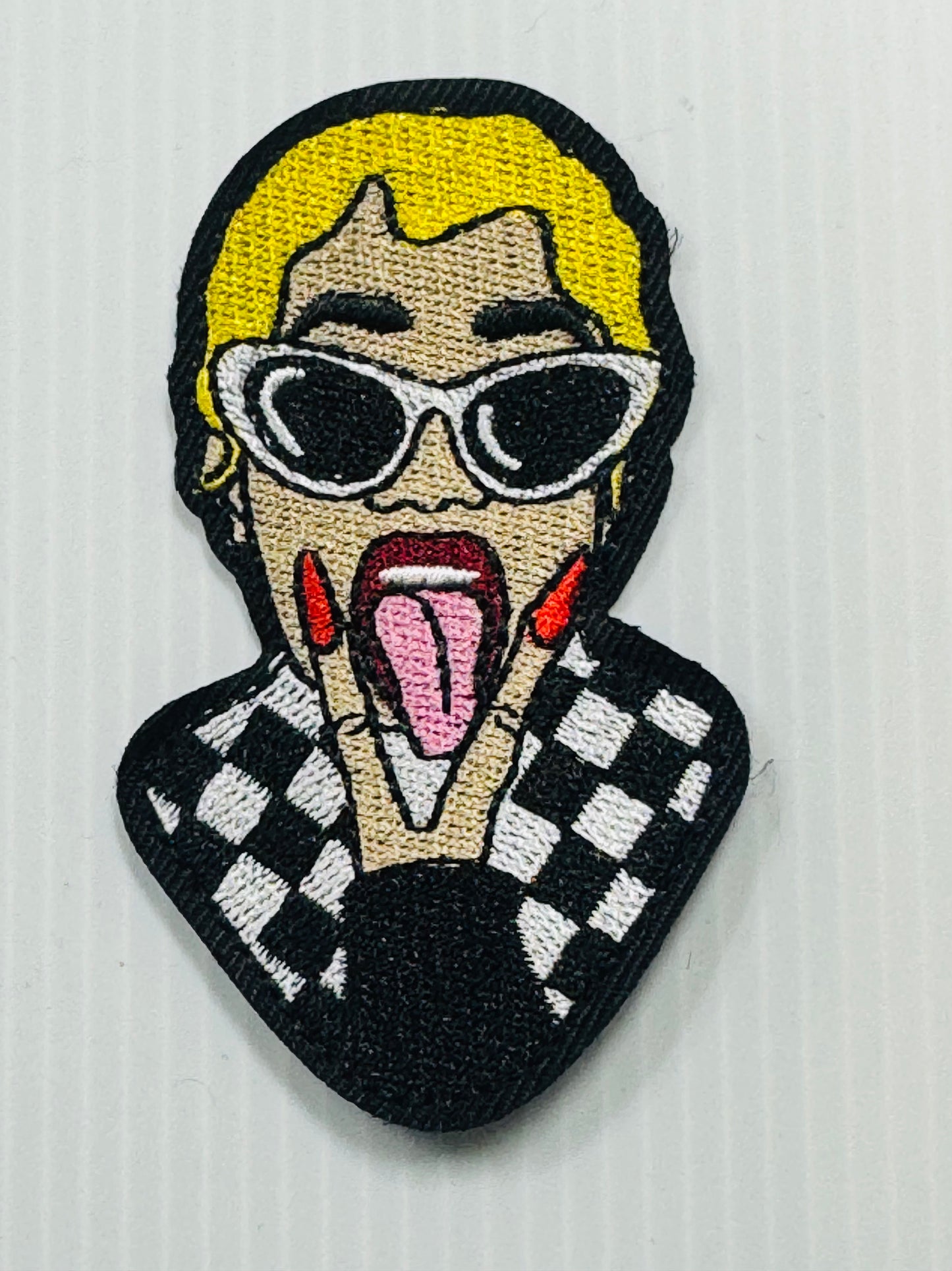 cardi B sticking out tongue