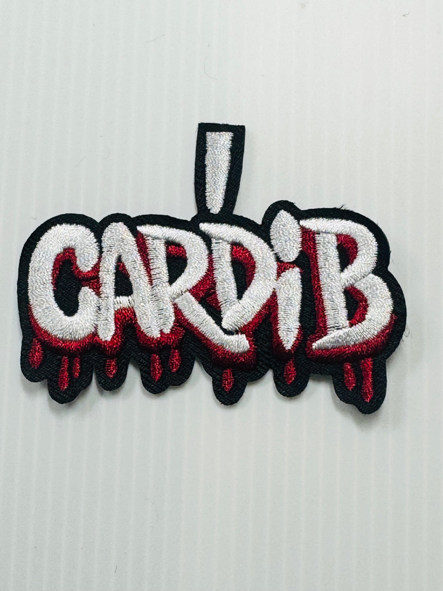 cardi b pendent