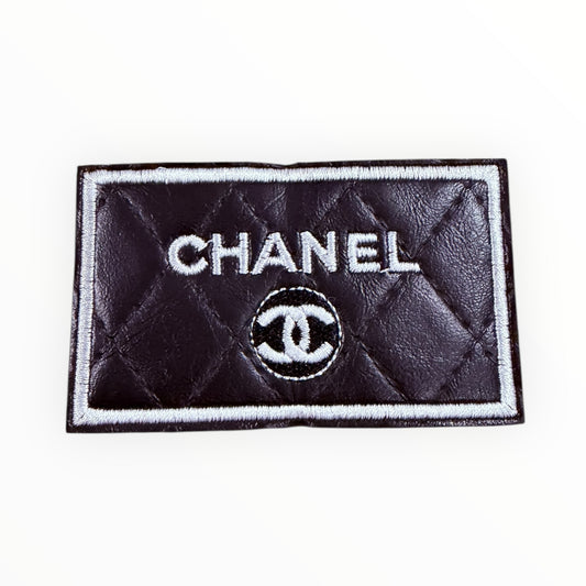 Faux black luxury-inspired rectangle patch