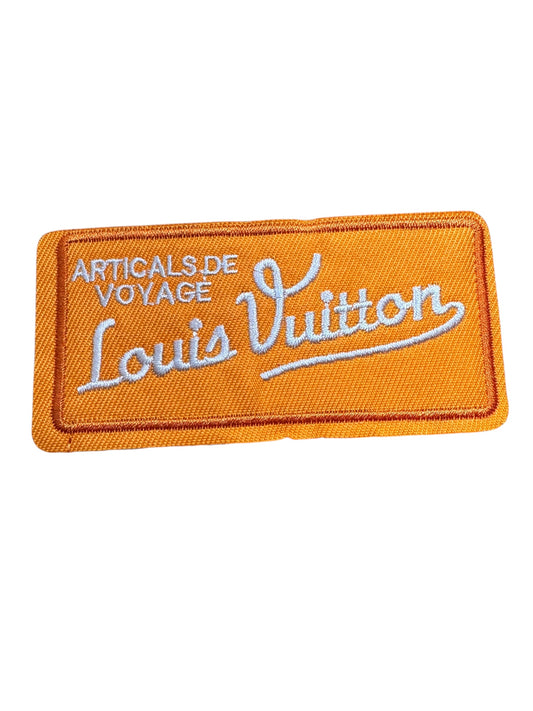 LV-INSPIRED ORANGE ARTICALS DE VOYAGE