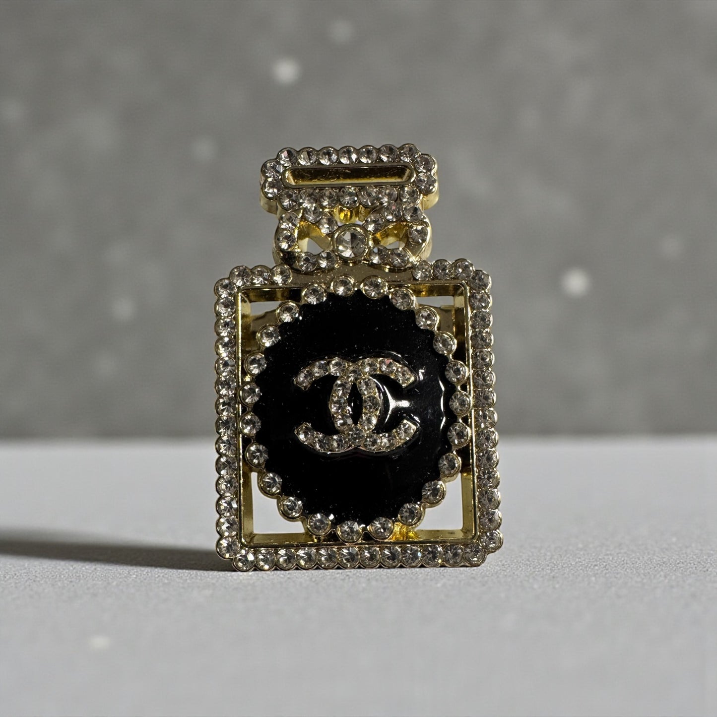 Black & Gold Perfume Bottle Brooch – Rhinestone Double-C Designer-Inspired Pin