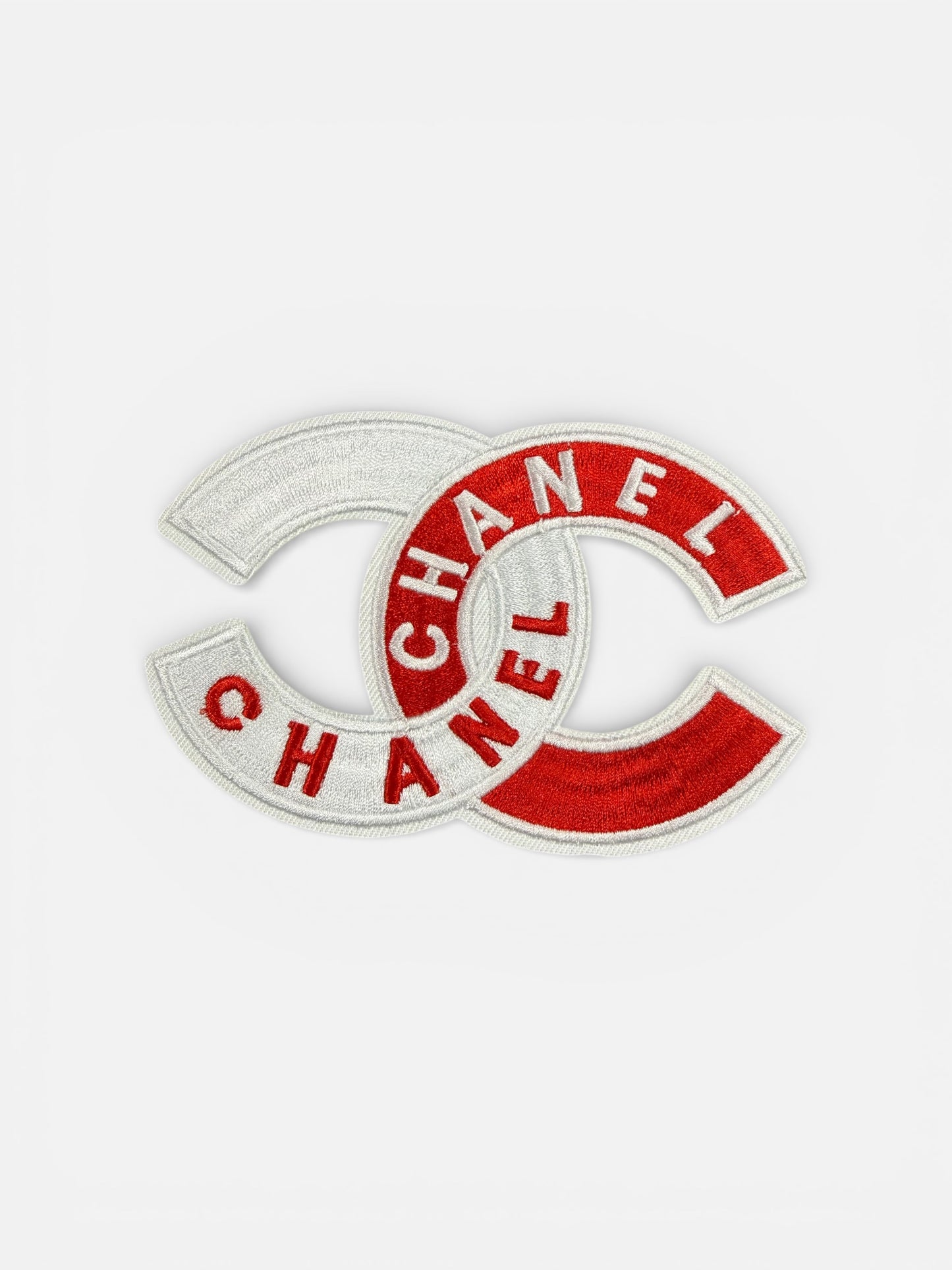 Double C interlocking patch design red/white