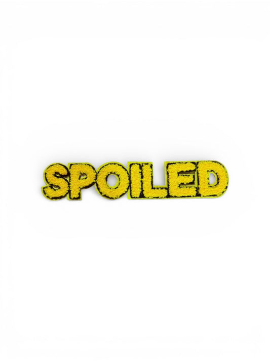 Spoiled chenille block letter patch
